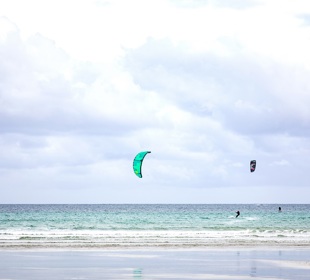 Kite surfer out at sea