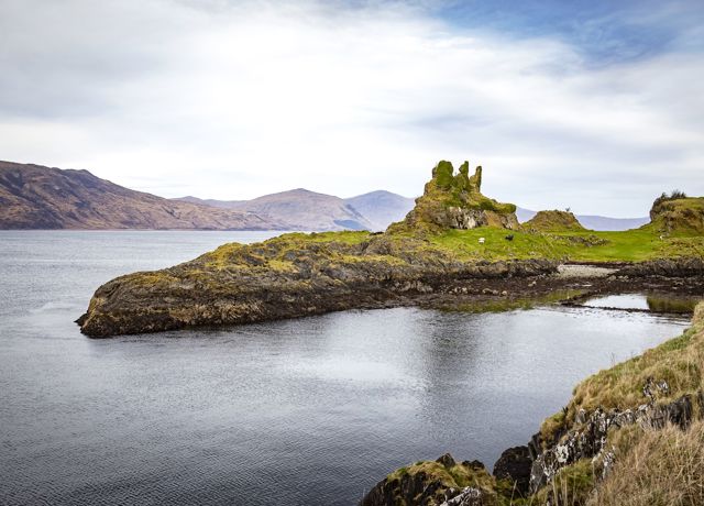 Castle Coeffin ruins, sitting on its lofted perch above the water, Lismore.